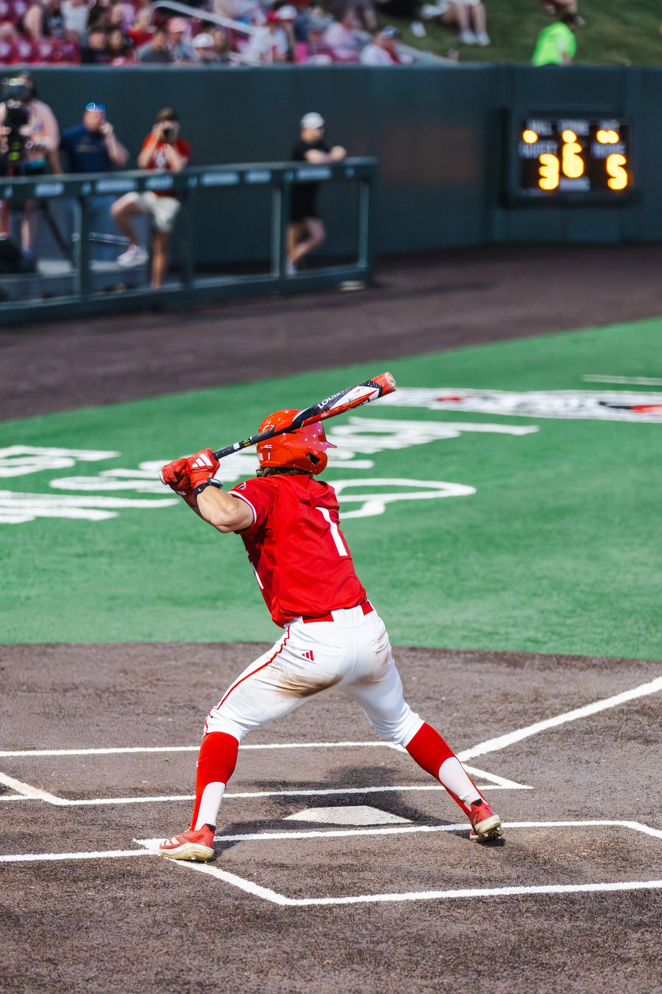 An NC State hitter loading his swing